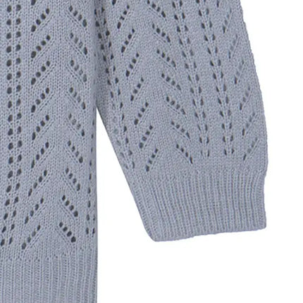 Jersey de punto de varios bloques para mujer con cremallera lateral y cierre de botón 