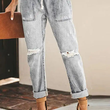Cargos de mezclilla con cintura ceñida para mujer con tobillos con puños y rodillas rasgadas 