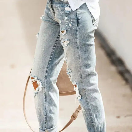 Vaqueros de mezclilla con puños y pierna recta rasgados estilo cinco bolsillos para mujer 