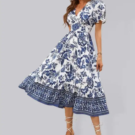 Vestido largo estampado con mangas abullonadas y estampado de posicionamiento en toda la prenda 