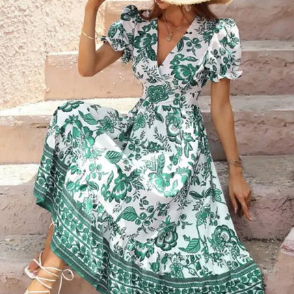 Vestido largo estampado con mangas abullonadas y estampado de posicionamiento en toda la prenda 