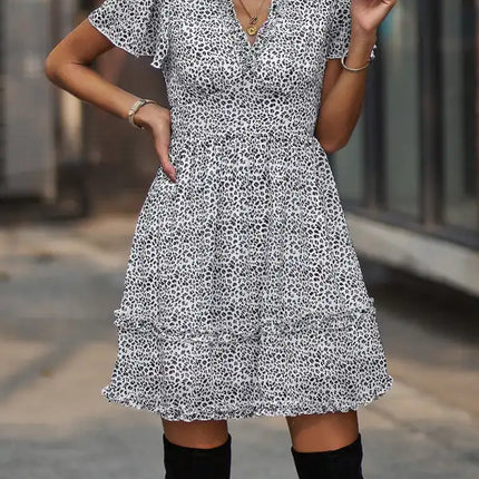 Minivestido cruzado sintético con mangas acampanadas y estampado floral para mujer 