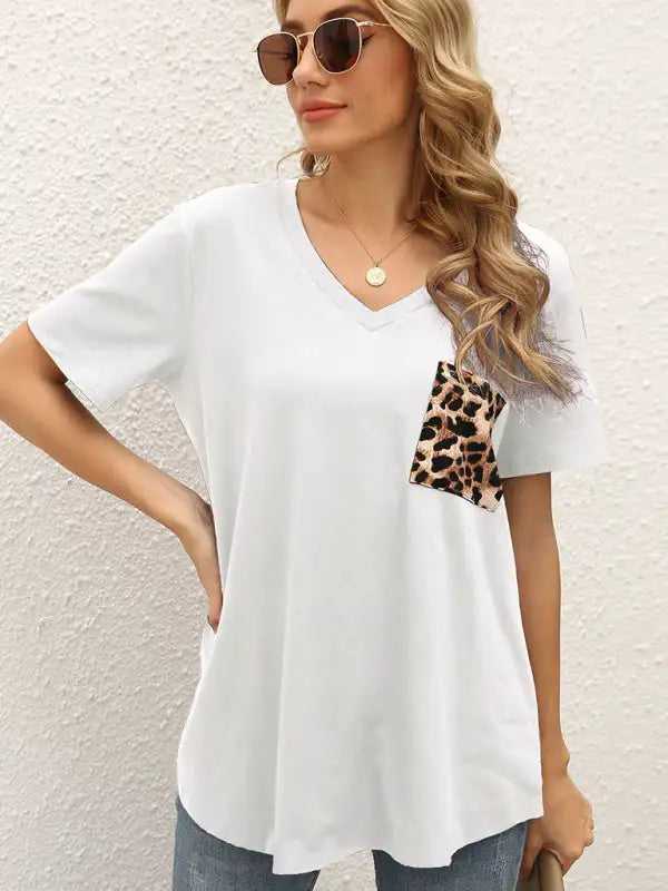 Nuevo top informal de punto con costura de leopardo holgado y cuello redondo 