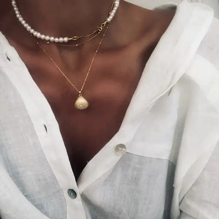 Pearl necklace with gold chain and gold shell necklace
