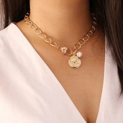 Gold chain and pearl necklace